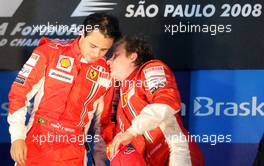 02.11.2008 Sao Paulo, Brazil,  Felipe Massa (BRA), Scuderia Ferrari and Kimi Raikkonen (FIN), Räikkönen, Scuderia Ferrari - Formula 1 World Championship, Rd 18, Brazilian Grand Prix, Sunday Podium
