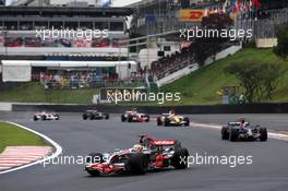 02.11.2008 Sao Paulo, Brazil,  Lewis Hamilton (GBR), McLaren Mercedes, MP4-23 leads Sebastian Vettel (GER), Scuderia Toro Rosso, STR03 - Formula 1 World Championship, Rd 18, Brazilian Grand Prix, Sunday Race