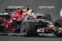 02.11.2008 Sao Paulo, Brazil,  Lewis Hamilton (GBR), McLaren Mercedes, MP4-23 and Sebastian Vettel (GER), Scuderia Toro Rosso, STR03 - Formula 1 World Championship, Rd 18, Brazilian Grand Prix, Sunday Race