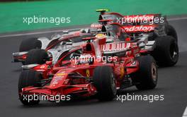 02.11.2008 Sao Paulo, Brazil,  Kimi Raikkonen (FIN), Räikkönen, Scuderia Ferrari, F2008 and Lewis Hamilton (GBR), McLaren Mercedes, MP4-23 - Formula 1 World Championship, Rd 18, Brazilian Grand Prix, Sunday Race