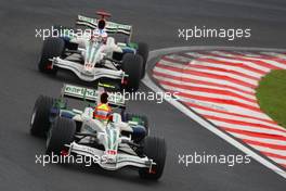 02.11.2008 Sao Paulo, Brazil,  Rubens Barrichello (BRA), Honda Racing F1 Team, RA108 and Jenson Button (GBR), Honda Racing F1 Team, RA108 - Formula 1 World Championship, Rd 18, Brazilian Grand Prix, Sunday Race