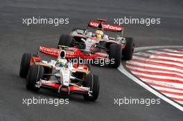 02.11.2008 Sao Paulo, Brazil,  Giancarlo Fisichella (ITA), Force India F1 Team, VJM-01 leads Lewis Hamilton (GBR), McLaren Mercedes, MP4-23 - Formula 1 World Championship, Rd 18, Brazilian Grand Prix, Sunday Race