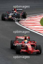 02.11.2008 Sao Paulo, Brazil,  Felipe Massa (BRA), Scuderia Ferrari leads Sebastian Vettel (GER), Scuderia Toro Rosso - Formula 1 World Championship, Rd 18, Brazilian Grand Prix, Sunday Race