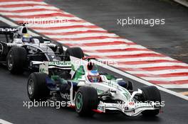 02.11.2008 Sao Paulo, Brazil,  Jenson Button (GBR), Honda Racing F1 Team leads Nico Rosberg (GER), WilliamsF1 Team - Formula 1 World Championship, Rd 18, Brazilian Grand Prix, Sunday Race
