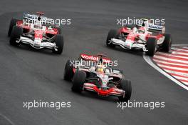 02.11.2008 Sao Paulo, Brazil,  Lewis Hamilton (GBR), McLaren Mercedes, Timo Glock (GER), Toyota F1 Team, Jarno Trulli (ITA), Toyota Racing - Formula 1 World Championship, Rd 18, Brazilian Grand Prix, Sunday Race