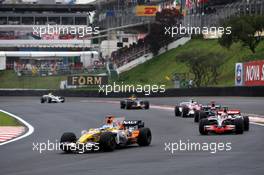 02.11.2008 Sao Paulo, Brazil,  Fernando Alonso (ESP), Renault F1 Team leads Heikki Kovalainen (FIN), McLaren Mercedes - Formula 1 World Championship, Rd 18, Brazilian Grand Prix, Sunday Race