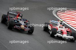 02.11.2008 Sao Paulo, Brazil,  Timo Glock (GER), Toyota F1 Team, Sebastian Bourdais (FRA), Scuderia Toro Rosso - Formula 1 World Championship, Rd 18, Brazilian Grand Prix, Sunday Race