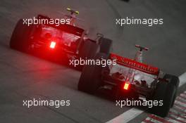 02.11.2008 Sao Paulo, Brazil,  Sebastian Vettel (GER), Scuderia Toro Rosso, STR03 overtakes Lewis Hamilton (GBR), McLaren Mercedes, MP4-23 - Formula 1 World Championship, Rd 18, Brazilian Grand Prix, Sunday Race