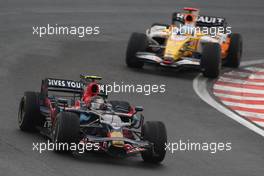 02.11.2008 Sao Paulo, Brazil,  Sebastian Vettel (GER), Scuderia Toro Rosso, STR03 and Fernando Alonso (ESP), Renault F1 Team, R28 - Formula 1 World Championship, Rd 18, Brazilian Grand Prix, Sunday Race