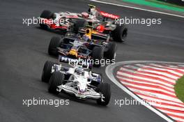 02.11.2008 Sao Paulo, Brazil,  Nick Heidfeld (GER), BMW Sauber F1 Team, F1.08 leads Mark Webber (AUS), Red Bull Racing, RB4 - Formula 1 World Championship, Rd 18, Brazilian Grand Prix, Sunday Race