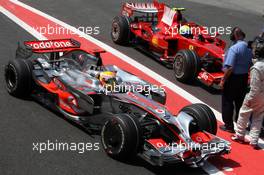 01.11.2008 Sao Paulo, Brazil,  Lewis Hamilton (GBR), McLaren Mercedes passes Felipe Massa (BRA), Scuderia Ferrari - Formula 1 World Championship, Rd 18, Brazilian Grand Prix, Saturday Qualifying