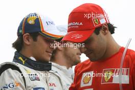 02.11.2008 Sao Paulo, Brazil,  Felipe Massa (BRA), Scuderia Ferrari and Nelson Piquet Jr (BRA), Renault F1 Team - Formula 1 World Championship, Rd 18, Brazilian Grand Prix, Sunday