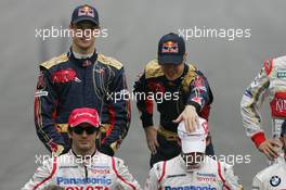 02.11.2008 Sao Paulo, Brazil,  Sebastian Vettel (GER), Scuderia Toro Rosso plays with the hat of Timo Glock (GER), Toyota F1 Team - Formula 1 World Championship, Rd 18, Brazilian Grand Prix, Sunday
