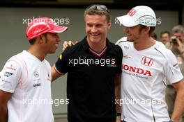 30.10.2008 Sao Paulo, Brazil,  Lewis Hamilton (GBR), McLaren Mercedes, David Coulthard (GBR), Red Bull Racing and Jenson Button (GBR), Honda Racing F1 Team, RB4, Wings For Life Livery - Formula 1 World Championship, Rd 18, Brazilian Grand Prix, Thursday