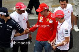 30.10.2008 Sao Paulo, Brazil,  Lewis Hamilton (GBR), McLaren Mercedes and Kimi Raikkonen (FIN), Räikkönen, Scuderia Ferrari shake hands - Formula 1 World Championship, Rd 18, Brazilian Grand Prix, Thursday