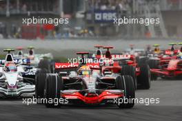 08.06.2008 Montreal, Canada,  Start, Lewis Hamilton (GBR), McLaren Mercedes, MP4-23 leads Robert Kubica (POL), BMW Sauber F1 Team, F1.08 - Formula 1 World Championship, Rd 7, Canadian Grand Prix, Sunday Race