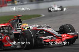 08.06.2008 Montreal, Canada,  Lewis Hamilton (GBR), McLaren Mercedes, MP4-23 and Robert Kubica (POL), BMW Sauber F1 Team, F1.08 - Formula 1 World Championship, Rd 7, Canadian Grand Prix, Sunday Race