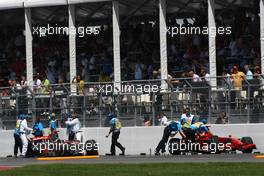 08.06.2008 Montreal, Canada,  The crash damaged cars of Kimi Raikkonen (FIN), Räikkönen, Scuderia Ferrari and Lewis Hamilton (GBR), McLaren Mercedes - Formula 1 World Championship, Rd 7, Canadian Grand Prix, Sunday Race