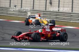 19.10.2008 Shanghai, China,  Felipe Massa (BRA), Scuderia Ferrari, F2008 leads Fernando Alonso (ESP), Renault F1 Team, R28 - Formula 1 World Championship, Rd 17, Chinese Grand Prix, Sunday Race