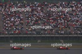 19.10.2008 Shanghai, China,  LOW RESOLUTION ONLY - Overtaking of Felipe Massa (BRA), Scuderia Ferrari / Kimi Raikkonen (FIN), Räikkönen, Scuderia Ferrari - Formula 1 World Championship, Rd 17, Chinese Grand Prix, Sunday Race