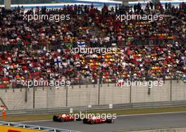 19.10.2008 Shanghai, China,  LOW RESOLUTION ONLY - Overtaking of Felipe Massa (BRA), Scuderia Ferrari / Kimi Raikkonen (FIN), Räikkönen, Scuderia Ferrari - Formula 1 World Championship, Rd 17, Chinese Grand Prix, Sunday Race