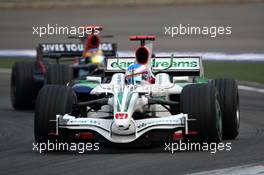 19.10.2008 Shanghai, China,  Jenson Button (GBR), Honda Racing F1 Team, RA108 leads Sebastian Bourdais (FRA), Scuderia Toro Rosso, STR03 - Formula 1 World Championship, Rd 17, Chinese Grand Prix, Sunday Race