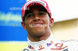 27.04.2008 Barcelona, Spain,  Lewis Hamilton (GBR), McLaren Mercedes / a wasp / bee is flying close to his face - Formula 1 World Championship, Rd 4, Spanish Grand Prix, Sunday Podium