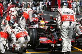 27.04.2008 Barcelona, Spain,  Lewis Hamilton (GBR), McLaren Mercedes during pitstop - Formula 1 World Championship, Rd 4, Spanish Grand Prix, Sunday Race