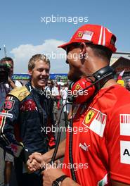 24.08.2008 Valencia, Spain,  Michael Schumacher (GER), Test Driver, Scuderia Ferrari and Sebastian Vettel (GER), Scuderia Toro Rosso - Formula 1 World Championship, Rd 12, European Grand Prix, Sunday Pre-Race Grid