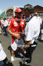 24.08.2008 Valencia, Spain,  Michael Schumacher (GER), Test Driver, Scuderia Ferrari and Dr. Mario Theissen (GER), BMW Sauber F1 Team, BMW Motorsport Director - Formula 1 World Championship, Rd 12, European Grand Prix, Sunday Pre-Race Grid