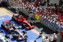 24.08.2008 Valencia, Spain,  The cars of Lewis Hamilton (GBR), McLaren Mercedes and Felipe Massa (BRA), Scuderia Ferrari in parc ferme - Formula 1 World Championship, Rd 12, European Grand Prix, Sunday Podium