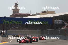 24.08.2008 Valencia, Spain,  Start, Felipe Massa (BRA), Scuderia Ferrari, F2008 leads Lewis Hamilton (GBR), McLaren Mercedes, MP4-23 - Formula 1 World Championship, Rd 12, European Grand Prix, Sunday Race