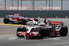 24.08.2008 Valencia, Spain,  Lewis Hamilton (GBR), McLaren Mercedes, MP4-23 leads Jarno Trulli (ITA), Toyota Racing, TF108 - Formula 1 World Championship, Rd 12, European Grand Prix, Sunday Race