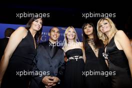 12.12.2008 Monte-Carlo, Monaco,   FIA Formula One World Championship - Lewis Hamilton (GBR), McLaren Mercedes, FIA Formula One World Champion with friends - 2008 FIA Gala Prize Giving Ceremony