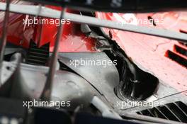 22.06.2008 Magny Cours, France,  Kimi Raikkonen (FIN), Räikkönen, Scuderia Ferrari, F2008, burnt bodywork and damaged exhaust - Formula 1 World Championship, Rd 8, French Grand Prix, Sunday Podium
