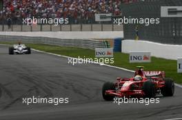 22.06.2008 Magny Cours, France,  Felipe Massa (BRA), Scuderia Ferrari, F2008 and Rubens Barrichello (BRA), Honda Racing F1 Team, RA108 - Formula 1 World Championship, Rd 8, French Grand Prix, Sunday Race
