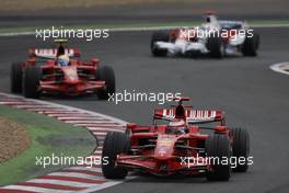 22.06.2008 Magny Cours, France,  Kimi Raikkonen (FIN), Räikkönen, Scuderia Ferrari, F2008 and Felipe Massa (BRA), Scuderia Ferrari, F2008 - Formula 1 World Championship, Rd 8, French Grand Prix, Sunday Race