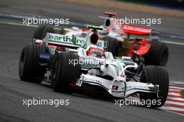 22.06.2008 Magny Cours, France,  Rubens Barrichello (BRA), Honda Racing F1 Team leads Adrian Sutil (GER), Force India F1 Team - Formula 1 World Championship, Rd 8, French Grand Prix, Sunday Race