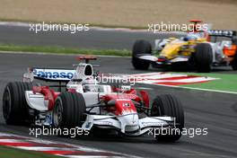 22.06.2008 Magny Cours, France,  Jarno Trulli (ITA), Toyota F1 Team, Fernando Alonso (ESP), Renault F1 Team  - Formula 1 World Championship, Rd 8, French Grand Prix, Sunday Race