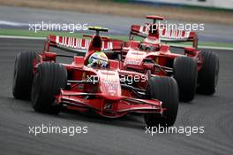 22.06.2008 Magny Cours, France,  Felipe Massa (BRA), Scuderia Ferrari leads Kimi Raikkonen (FIN), Räikkönen, Scuderia Ferrari  - Formula 1 World Championship, Rd 8, French Grand Prix, Sunday Race