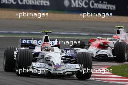 22.06.2008 Magny Cours, France,  Robert Kubica (POL), BMW Sauber F1 Team, F1.08 leads Timo Glock (GER), Toyota F1 Team, TF108 - Formula 1 World Championship, Rd 8, French Grand Prix, Sunday Race