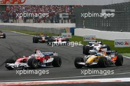 22.06.2008 Magny Cours, France,  Jarno Trulli (ITA), Toyota Racing, TF108 and Fernando Alonso (ESP), Renault F1 Team, R28 - Formula 1 World Championship, Rd 8, French Grand Prix, Sunday Race