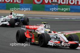 22.06.2008 Magny Cours, France,  Giancarlo Fisichella (ITA), Force India F1 Team leads Rubens Barrichello (BRA), Honda Racing F1 Team - Formula 1 World Championship, Rd 8, French Grand Prix, Sunday Race