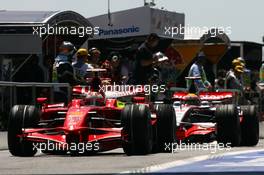 21.06.2008 Magny Cours, France,  Kimi Raikkonen (FIN), Räikkönen, Scuderia Ferrari, F2008 followed by Lewis Hamilton (GBR), McLaren Mercedes, MP4-23 - Formula 1 World Championship, Rd 8, French Grand Prix, Saturday Qualifying