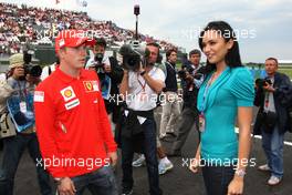 22.06.2008 Magny Cours, France,  Kimi Raikkonen (FIN), Räikkönen, Scuderia Ferrari with Miss France - Formula 1 World Championship, Rd 8, French Grand Prix, Sunday