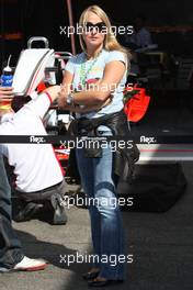 19.06.2008 Magny Cours, France,  A woman outside Force India - Formula 1 World Championship, Rd 8, French Grand Prix, Thursday