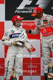 06.07.2008 Silverstone, England,  Nick Heidfeld (GER), BMW Sauber F1 Team with 1st place Lewis Hamilton (GBR), McLaren Mercedes - Formula 1 World Championship, Rd 9, British Grand Prix, Sunday Podium