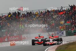 06.07.2008 Silverstone, England,  Lewis Hamilton (GBR), McLaren Mercedes, MP4-23 and Heikki Kovalainen (FIN), McLaren Mercedes, MP4-23 - Formula 1 World Championship, Rd 9, British Grand Prix, Sunday Race