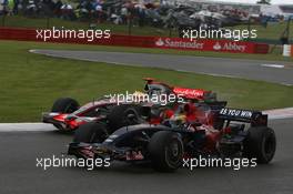 06.07.2008 Silverstone, England,  Lewis Hamilton (GBR), McLaren Mercedes, MP4-23 and Sebastian Bourdais (FRA), Scuderia Toro Rosso, STR03 - Formula 1 World Championship, Rd 9, British Grand Prix, Sunday Race