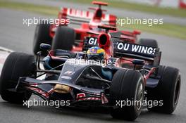 06.07.2008 Silverstone, England,  Sebastian Bourdais (FRA), Scuderia Toro Rosso leads Kimi Raikkonen (FIN), Räikkönen, Scuderia Ferrari - Formula 1 World Championship, Rd 9, British Grand Prix, Sunday Race